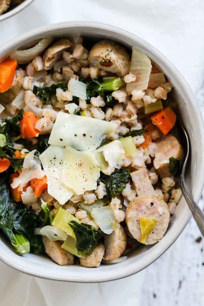 Bowl of lemony chicken sausage and farro soup