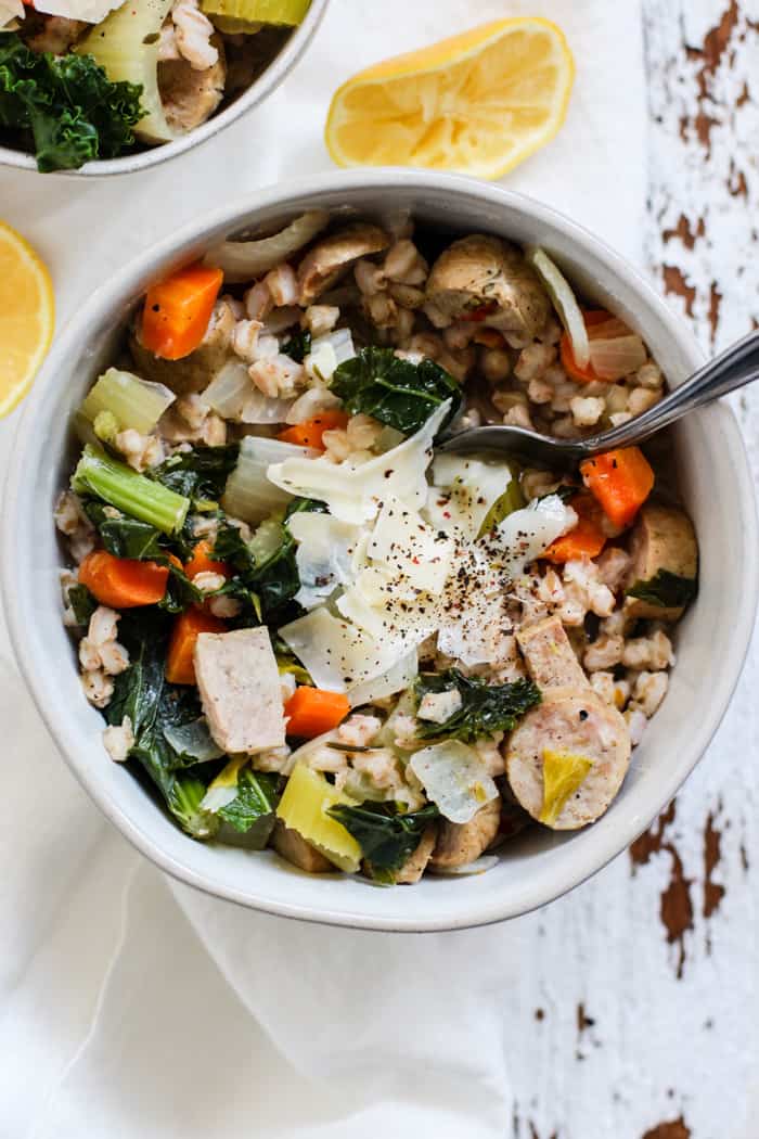 Bowl of lemony chicken sausage and farro soup