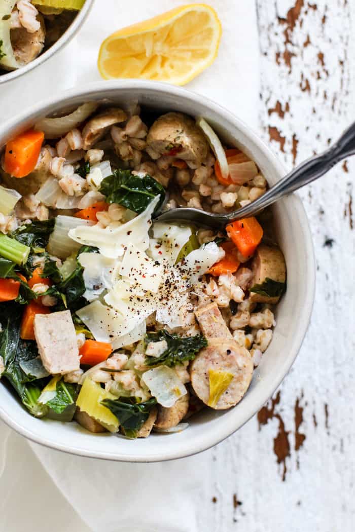 Bowl of lemony chicken sausage and farro soup