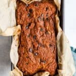 Pumpkin chocolate chip bread in a loaf pan.
