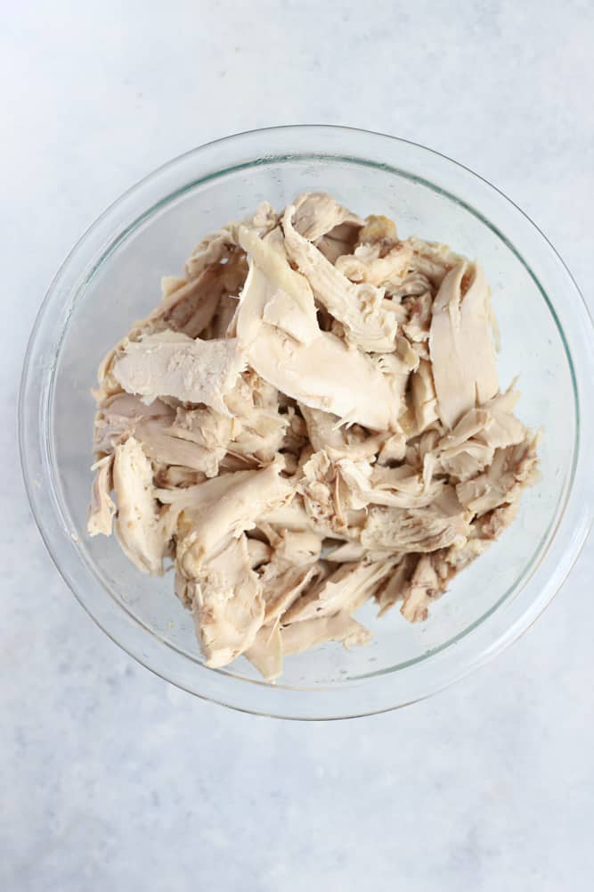 Shredded cooked chicken for soup.