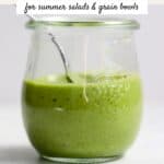 Homemade basil vinaigrette in a small jar.