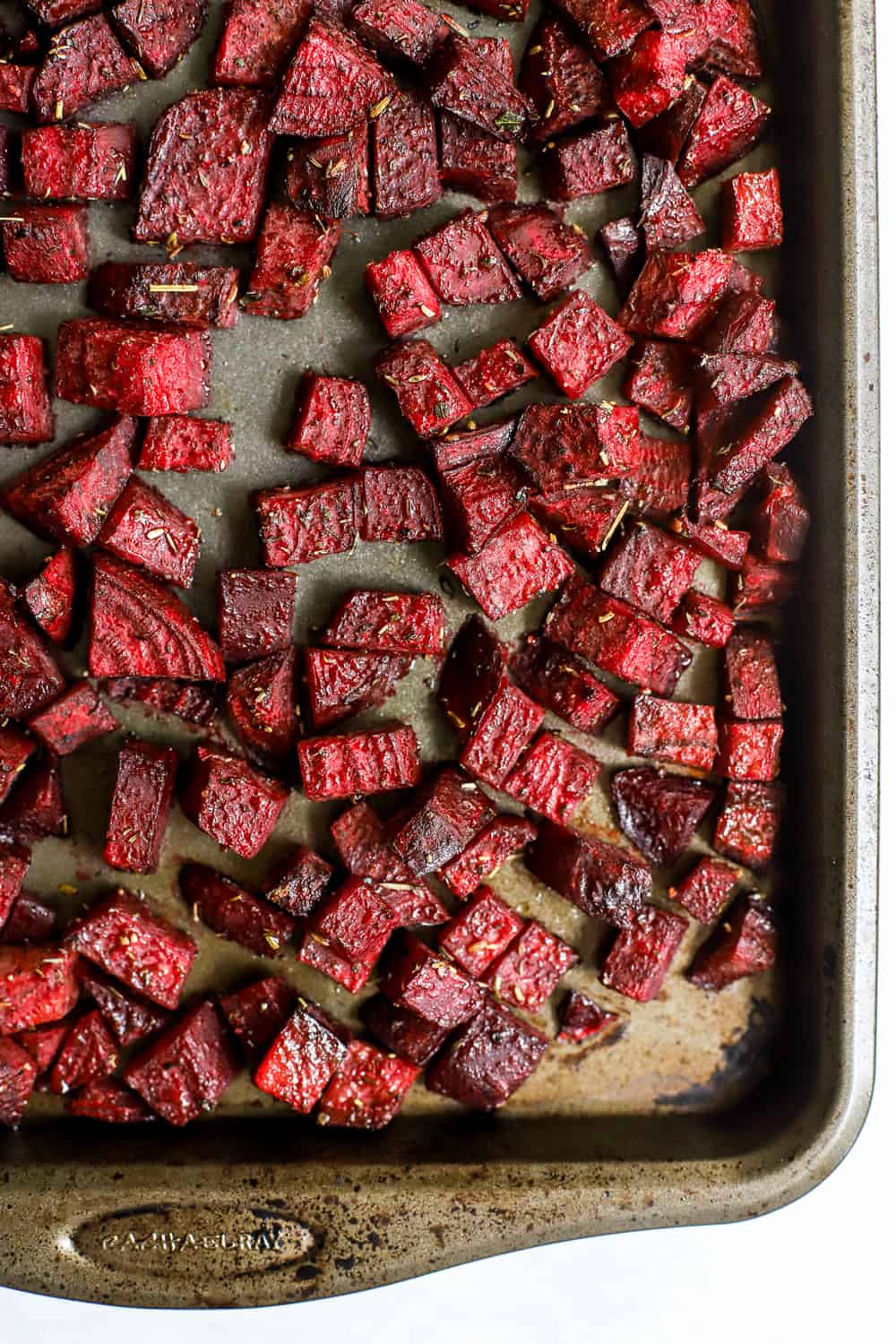 Simple herb roasted beets on sheet pan.