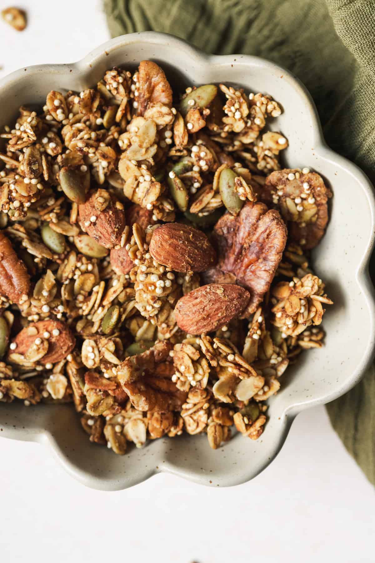 Pumpkin spice granola in a small bowl.