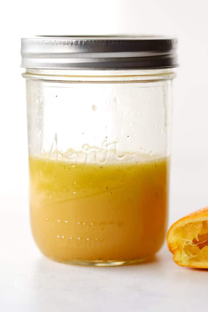 Simple orange vinaigrette in a jar.