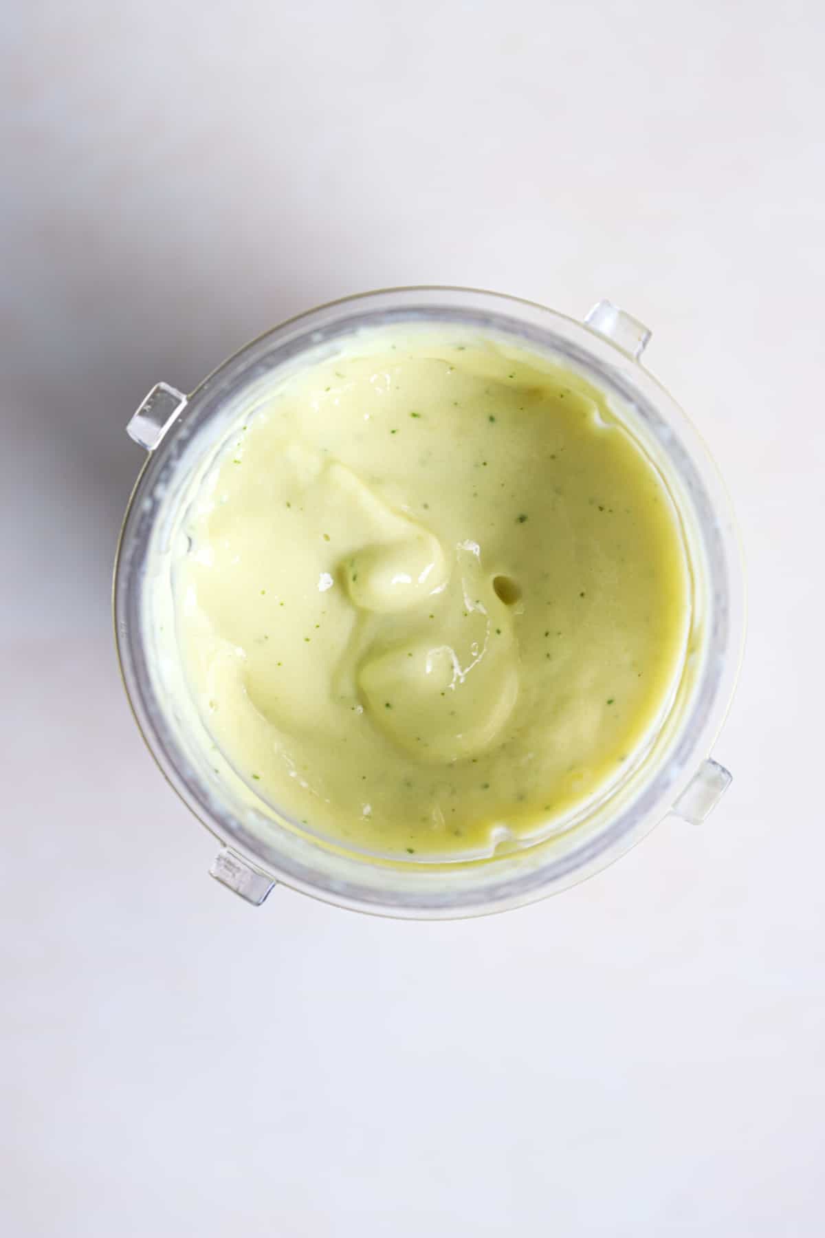 Thick and creamy smoothie blended in blender.