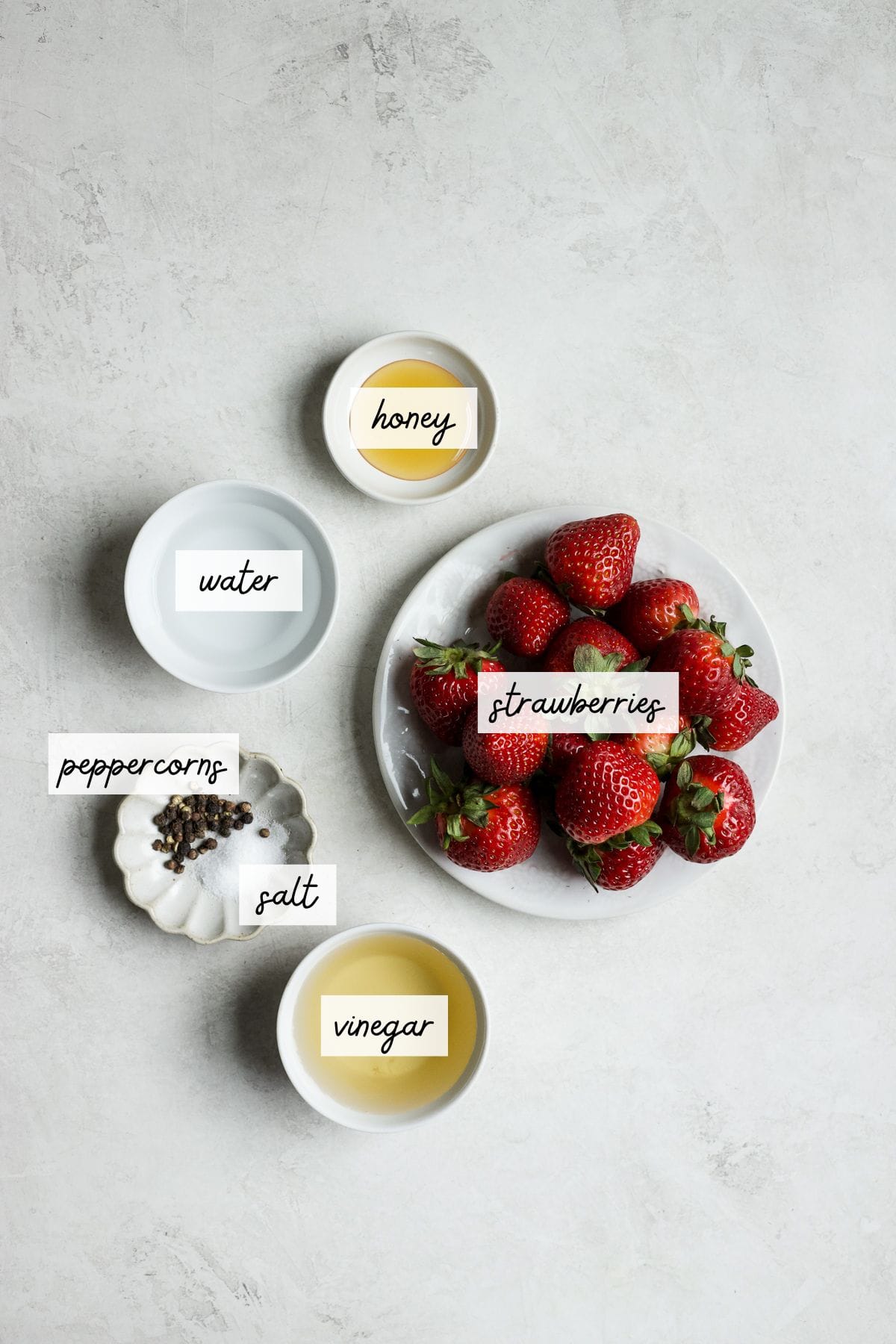 Ingredients required to make quick pickled strawberries.