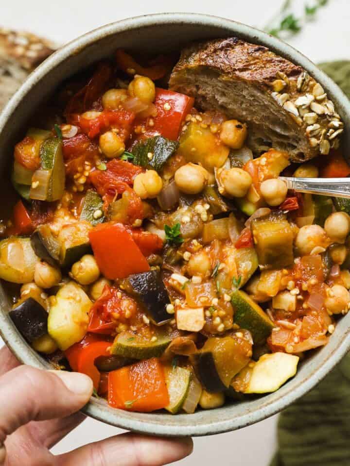 Holding a cozy bowl of one pot ratatouille.