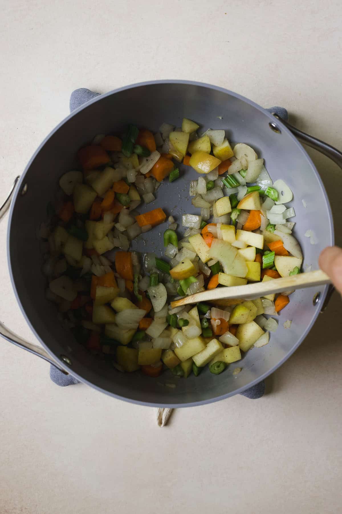 Sautéing aromatics for fall butternut squash soup.