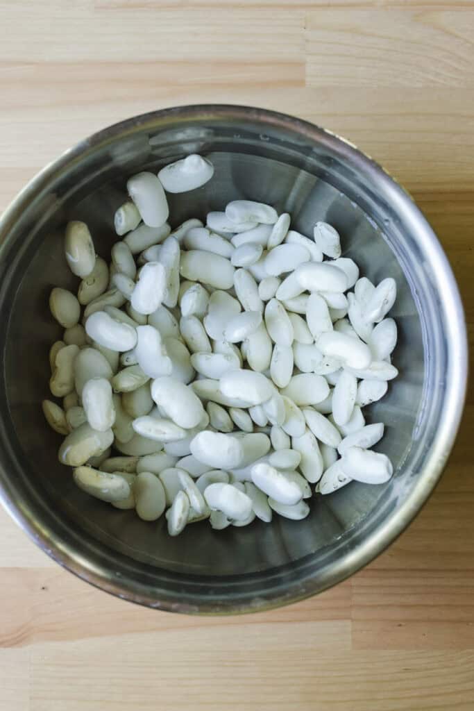 Soaking beans in a bowl of water.