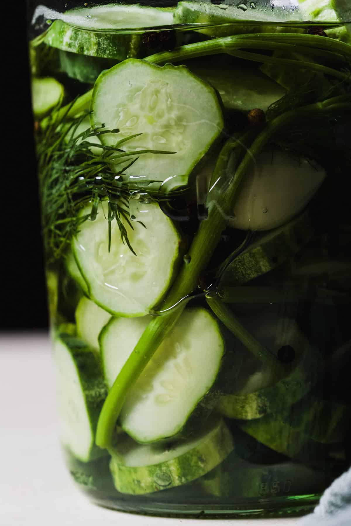 Cucumber fridge pickles in a Weck jar.